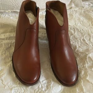 Frye ankle boots. Dark Camel, very stylish & sturdy. Very well made.